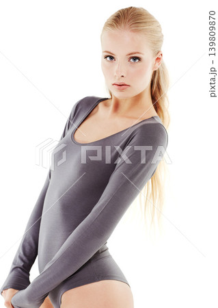 Style, portrait and woman in leotard in studio for creative, art and ballet dancing entertainment. Confidence, beauty and serious female dancer in body suit for ballerina fashion by white background. Style, portrait and woman in leotard in studio for creative, art and ballet dancing entertainment. Confidence, beauty and serious female dancer in body suit for ballerina fashion by white background. 139809870