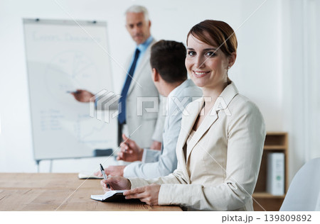 Woman, portrait and notes for work presentation with graphs or business growth, kpi or mentorship. Female person, face and colleagues with white board or results analysis or training, coach or chart 139809892
