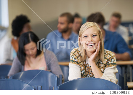Portrait, confident or happy woman in classroom for knowledge, school development or future. Scholarship, education or face of student with smile or pride for studying or learning in college campus 139809938