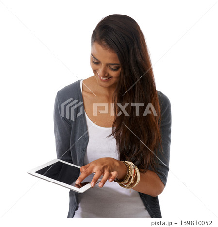 Tablet, happy and woman in studio networking or scroll on social media, app or the internet. Smile, communication and female person browsing on website with digital technology by white background. 139810052