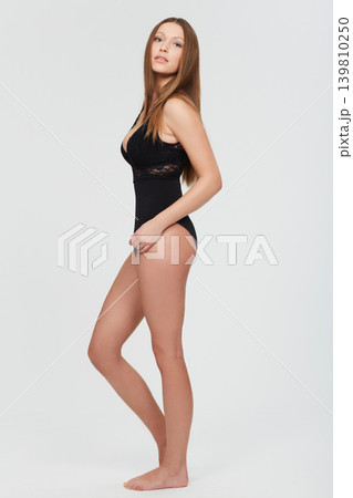 Beauty, body and portrait of woman with lingerie in studio for wellness, care or glowing skin on white background. Shape, underwear and female model with confidence, attitude or classy style choice Beauty, body and portrait of woman with lingerie in studio for wellness, care or glowing skin on white background. Shape, underwear and female model with confidence, attitude or classy style choice 139810250