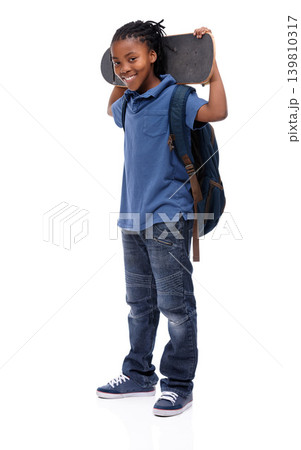 Portrait, skateboard and happy african boy in studio isolated on white background for sports or leisure. Kids, smile or training and confident young skater kid with board for fun or recreation 139810317