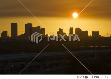 View from above of contemporary high skyscraper buildings in downtown district of Tampa city in Florida, USA at sunset. American megapolis with business financial district View from above of contemporary high skyscraper buildings in downtown district of Tampa city in Florida, USA at sunset. American megapolis with business financial district 139810945