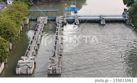 aerial view shows a river dam and water control management system aerial view shows a river dam and water control management system 139813061