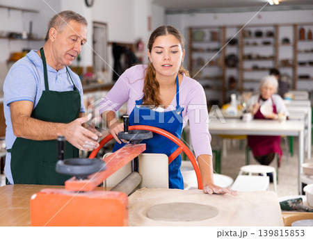 potter in workshop is working with student potter in workshop is working with student 139815853