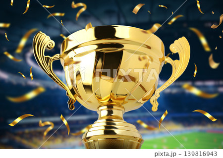 Golden trophy shines amid confetti during sports celebration 139816943
