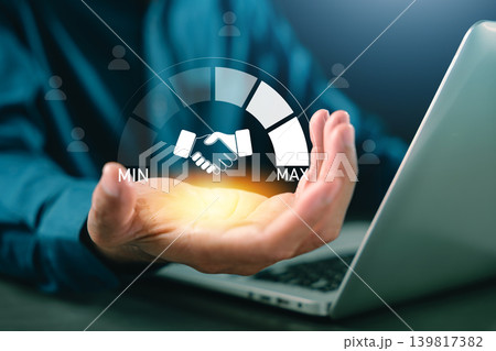 Professional shows partner trustworthy confidence trust trust business connection using virtual handshake gauge above laptop, indicating high level of collaboration for corporate success 139817382