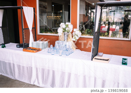 Elegant food and beverage display table at luxury wedding reception Elegant food and beverage display table at luxury wedding reception 139819088