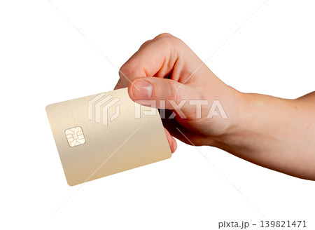 Hand holding gold bank card between fingers. Payment card displayed in gesture. Financial banking concept for purchase payment and transaction.. Hand holding gold bank card between fingers. Payment card displayed in gesture. Financial banking concept for purchase payment and transaction.. 139821471