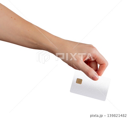 Hand lowering bank card with fingers. Payment card held delicately in gesture. Financial transaction concept for digital banking purchase.. Hand lowering bank card with fingers. Payment card held delicately in gesture. Financial transaction concept for digital banking purchase.. 139821482