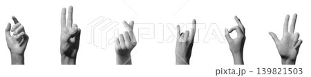 Hand shows symbolic finger gestures including victory sign, finger heart, horn sign, and circle gesture against neutral background. Digits form expressive shapes used for communication and 139821503