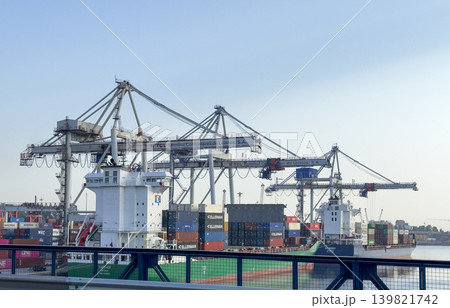 Porto Portugal May 20 2025 Cargo containers at seaport terminal with cranes and shipping vessels. 139821742