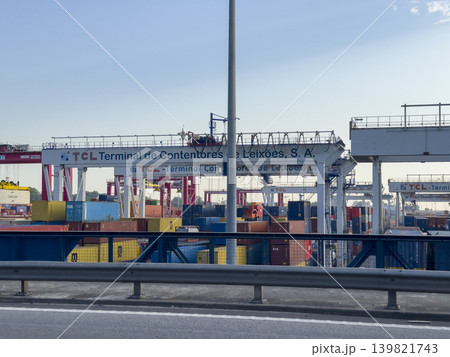 Porto Portugal May 20 2025 Logistic harbor with stacked containers and cargo cranes at port terminal 139821743