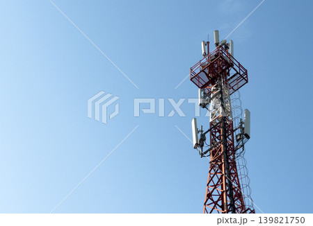 Telecom tower with antennae against blue sky. Wireless communication network infrastructure for Telecom tower with antennae against blue sky. Wireless communication network infrastructure for 139821750