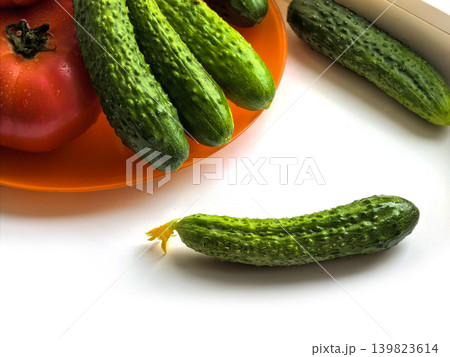 Single Cucumber With Fresh Vegetables Background Single Cucumber With Fresh Vegetables Background 139823614