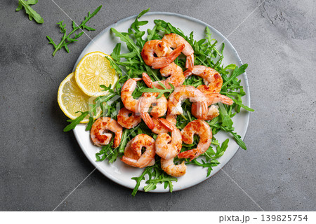 Salad with grilled shrimps prawns and arugula greens Salad with grilled shrimps prawns and arugula greens 139825754