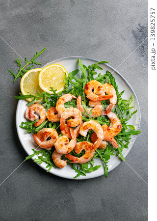 Grilled shrimps prawns and arugula salad, healthy eating 139825757