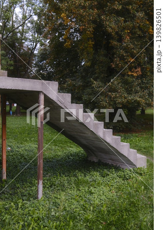 Concrete stairs, wood supports, grass, trees Concrete stairs, wood supports, grass, trees 139826501