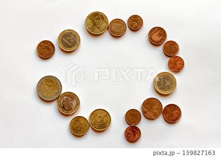 many different euro coins on white table, top view	 139827163