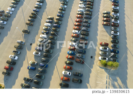 Large parking lot of local dealer with many brand new cars parked for sale. Development of american automotive industry and distribution of manufactured vehicles concept Large parking lot of local dealer with many brand new cars parked for sale. Development of american automotive industry and distribution of manufactured vehicles concept 139830615