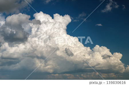 Rain clouds forming on blue Florida sky. Colorful summer skyscape Rain clouds forming on blue Florida sky. Colorful summer skyscape 139830616