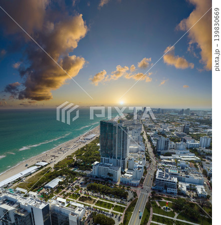 Popular vacation spot in the United States. Ocean warm waters and sandy beachfront at Miami Beach in Florida, USA. American travel destination Popular vacation spot in the United States. Ocean warm waters and sandy beachfront at Miami Beach in Florida, USA. American travel destination 139830669