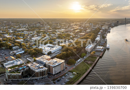 Famous River Street in historical Savannah, Georgia. Urban landscape of old historic city. USA cityscape at sunset Famous River Street in historical Savannah, Georgia. Urban landscape of old historic city. USA cityscape at sunset 139830700