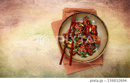 yakitori chicken kebab, on a plate, with green onions and sesame seeds, top view, no people, 139832694