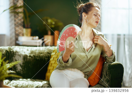 Woman Cooling Down from Summer Heat Woman Cooling Down from Summer Heat 139832956