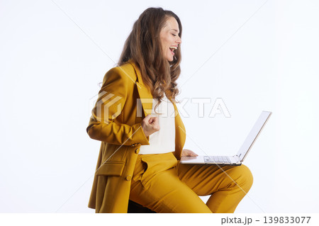 Businesswoman Celebrates Online Success 139833077
