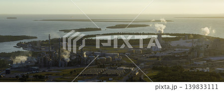 Mosaic Riverview Plant in Tampa, Florida. Factory for handling and processing of phosphates. Industrial facility for chemical production of phosphoric acid Mosaic Riverview Plant in Tampa, Florida. Factory for handling and processing of phosphates. Industrial facility for chemical production of phosphoric acid 139833111
