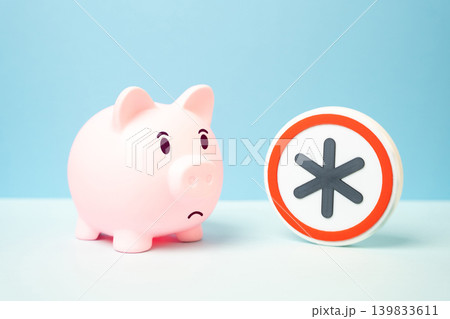 Piggy bank weighed down by hidden contract terms. Restrictions and penalties on deposits and savings at the bank. Financial pressure and unfair banking rules. Piggy bank weighed down by hidden contract terms. Restrictions and penalties on deposits and savings at the bank. Financial pressure and unfair banking rules. 139833611