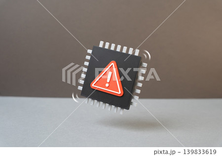 Microchip with warning. Shortage of chips and electronic components. Factory defects, damaged hardware and risks from defective semiconductor batches. 139833619