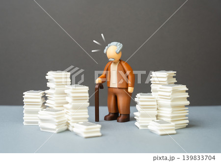 A grandfather with a cane is shocked by bureaucracy and bureaucratic procedures. Excessive paperwork, administrative barriers and difficulties with official documents. A grandfather with a cane is shocked by bureaucracy and bureaucratic procedures. Excessive paperwork, administrative barriers and difficulties with official documents. 139833704