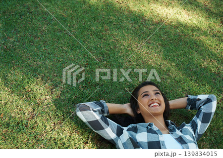 Mockup, park or happy woman on grass to relax for rest in garden, nature or field for peace. Space, travel or female person on break with smile on outdoor summer vacation or holiday on lawn in USA Mockup, park or happy woman on grass to relax for rest in garden, nature or field for peace. Space, travel or female person on break with smile on outdoor summer vacation or holiday on lawn in USA 139834015