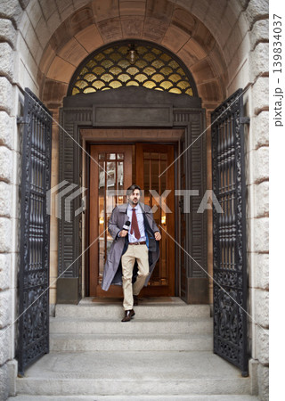 News reporter, business and man with feedback, walking and deadline for broadcasting and journalist. Person on steps, leaving and employee with a microphone and interview in a city and review story 139834037