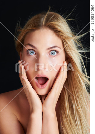 Beauty, hair and portrait of woman with shock, straight hairstyle and healthy keratin treatment isolated in dark studio. Salon styling, wow and face of girl with surprise haircare on black background Beauty, hair and portrait of woman with shock, straight hairstyle and healthy keratin treatment isolated in dark studio. Salon styling, wow and face of girl with surprise haircare on black background 139834064