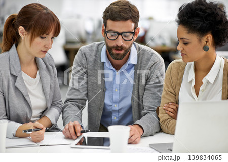 Businessman, tablet and meeting with team in research, planning or brainstorming at office. Business people, group or employees with technology or notebook in project plan or development at workplace Businessman, tablet and meeting with team in research, planning or brainstorming at office. Business people, group or employees with technology or notebook in project plan or development at workplace 139834065