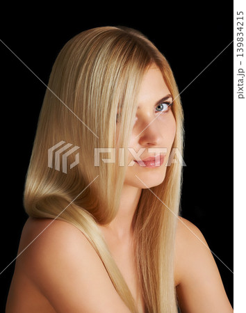 Beauty, hair and portrait of woman with blonde hairstyle, salon care and keratin treatment isolated in dark studio. Styling, glow and face of girl with healthy haircare shine on black background. 139834215