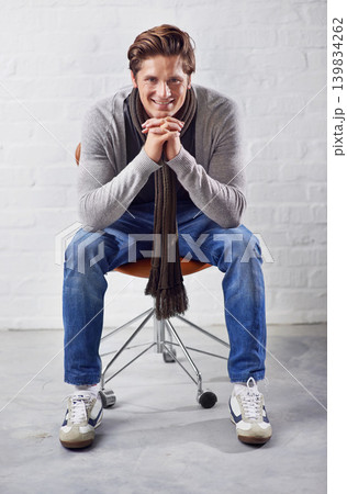 Fashion, portrait and happy man thinking on a chair with memory, insight or solution on wall background. Face, idea and male person with problem solving solution, answer or plan, inspiration or guess Fashion, portrait and happy man thinking on a chair with memory, insight or solution on wall background. Face, idea and male person with problem solving solution, answer or plan, inspiration or guess 139834262