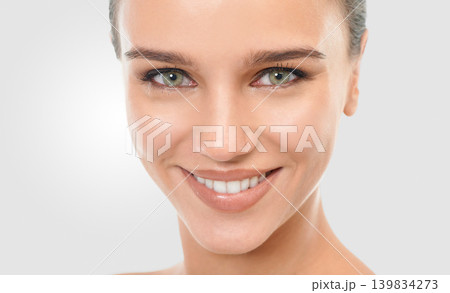 Woman, skincare and glow in studio portrait, confidence and proud of results on white background. Happy female person, shine and smile for facial treatment, cosmetics and dermatology for grooming Woman, skincare and glow in studio portrait, confidence and proud of results on white background. Happy female person, shine and smile for facial treatment, cosmetics and dermatology for grooming 139834273