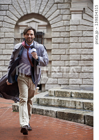 Happy, media and man in city, news reporter and journalist in New York and employee with feedback. Person, smile and guy with a microphone, review or reporting for television and broadcasting career 139834315