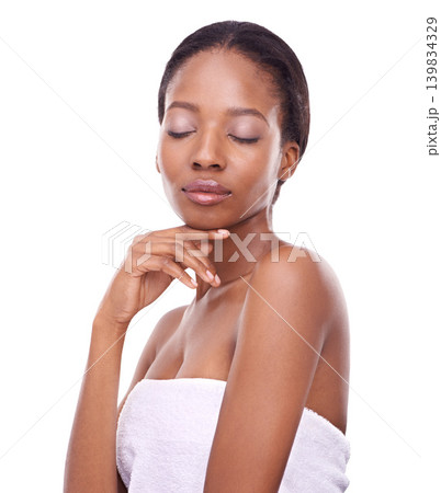 Woman, skincare and cosmetics in studio with natural, beauty and glow on white background. Black female person, isolated and makeup on face with hand pose for wellness, treatment or feminine grooming 139834329