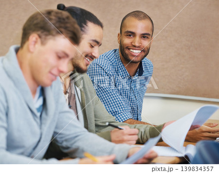 Student, college and man in classroom portrait, information and notes for studying. People, assignment and knowledge in education for learning, problem solving and ideas for solution in assessment Student, college and man in classroom portrait, information and notes for studying. People, assignment and knowledge in education for learning, problem solving and ideas for solution in assessment 139834357