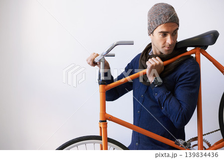 Man, studio and bicycle for sustainability, transportation or exercise on white background. Hipster cyclist, carbon neutral and eco friendly travel for environmental commute or fitness and trip Man, studio and bicycle for sustainability, transportation or exercise on white background. Hipster cyclist, carbon neutral and eco friendly travel for environmental commute or fitness and trip 139834436