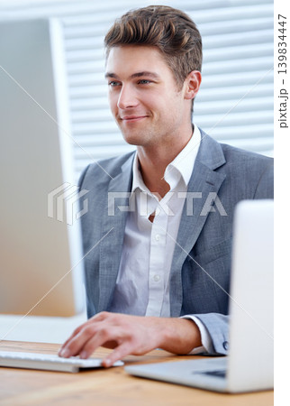 Businessman, laptop and computer with office, workspace and technology for work. Employee, corporate and desktop for accounting, business and review with research for planning or information Businessman, laptop and computer with office, workspace and technology for work. Employee, corporate and desktop for accounting, business and review with research for planning or information 139834447