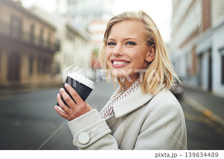 Happy, travel and face of woman with coffee in city for work commute, walking and journey in street. Business, fashion and person with beverage, drink and cappuccino for adventure in urban town Happy, travel and face of woman with coffee in city for work commute, walking and journey in street. Business, fashion and person with beverage, drink and cappuccino for adventure in urban town 139834489