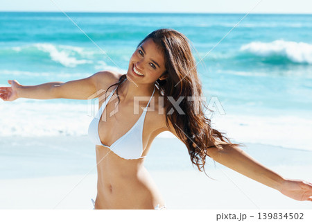 Water, portrait and happy woman on beach with freedom, bikini and excited for summer holiday in Cancun. Smile, sun and girl on ocean vacation with adventure, travel and relax on tropical island. Water, portrait and happy woman on beach with freedom, bikini and excited for summer holiday in Cancun. Smile, sun and girl on ocean vacation with adventure, travel and relax on tropical island. 139834502