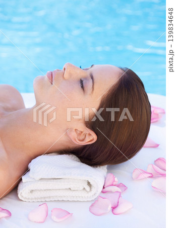 Relax, massage and woman at luxury spa pool with petals for health, wellness balance and holistic treatment. Self care, peace and girl on poolside bed for body, comfort and calm hotel service Relax, massage and woman at luxury spa pool with petals for health, wellness balance and holistic treatment. Self care, peace and girl on poolside bed for body, comfort and calm hotel service 139834648