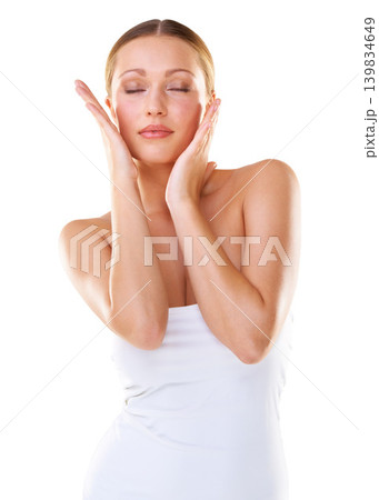 Woman, face and soft skin for beauty and health on a white studio background with wellness. Touch, smooth and female person with confidence for treatment with cosmetic dermatology on a backdrop Woman, face and soft skin for beauty and health on a white studio background with wellness. Touch, smooth and female person with confidence for treatment with cosmetic dermatology on a backdrop 139834649